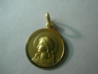 medalla santa cristina oro plata